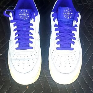 Nike White Low-Top Sneakers with Purple Laces and Collar